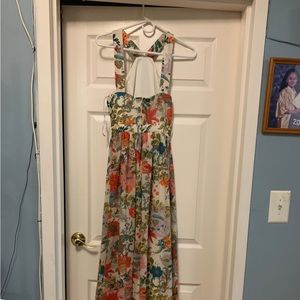 Women dress in two different sizes. One is a SMALL & One is a MEDIUM